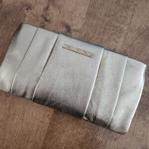 Michael Kors gold clutch